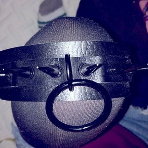 Black spiked collar/choker.